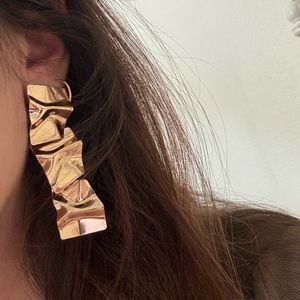 Gold statement earrings